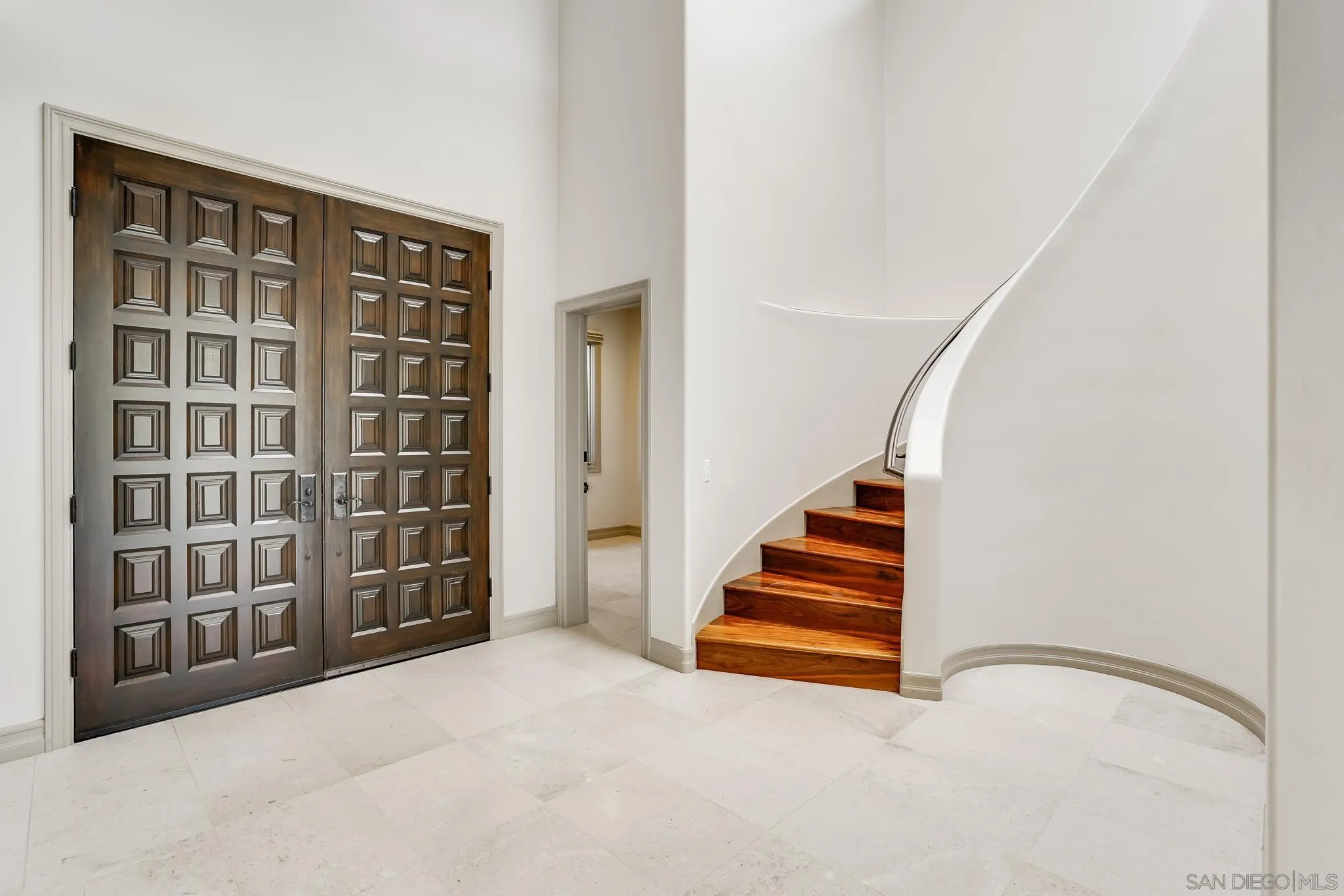 1346 Crest Road Del Mar, CA 92014 - Photo 10 of 64 a view of an entryway with stairs