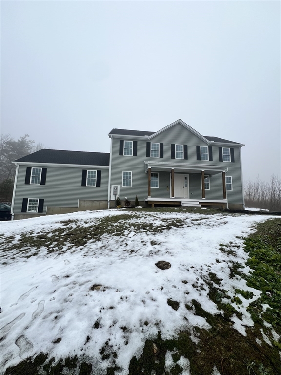 252 East County Road Rutland, MA 01543 - Photo 1 of 42 a front view of a house with a yard