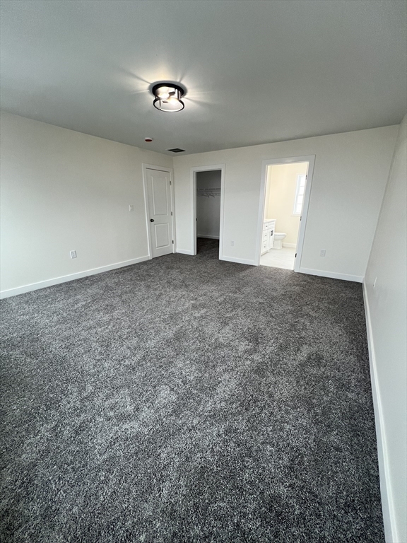 252 East County Road Rutland, MA 01543 - Photo 28 of 42 an empty room with a natural light