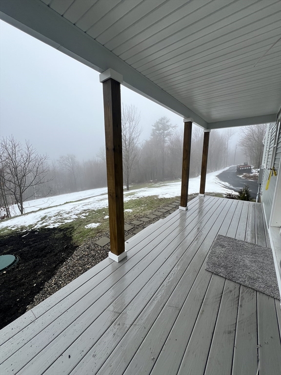 252 East County Road Rutland, MA 01543 - Photo 3 of 42 a view of a balcony with wooden floor