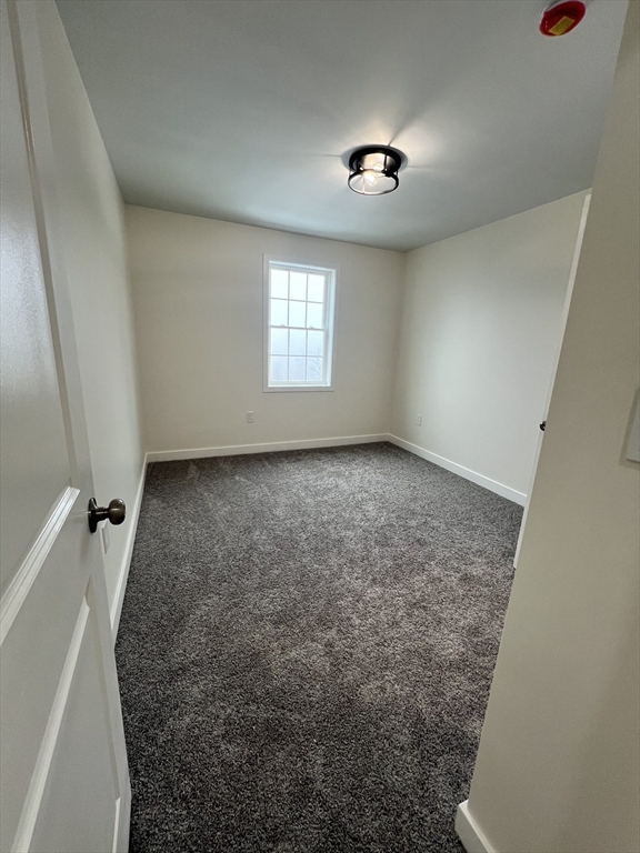 252 East County Road Rutland, MA 01543 - Photo 36 of 42 wooden floor in an empty room with a window