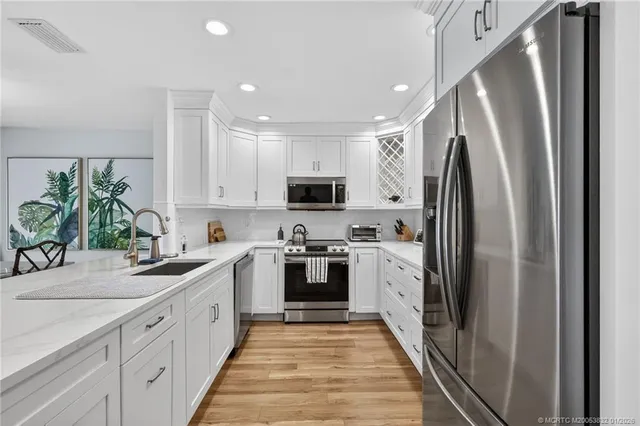 a bedroom with a bed and a night stand