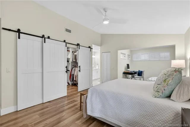 a spacious bathroom with a double vanity sink mirror and double