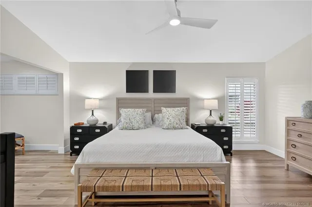 a view of walk in closet with clothes