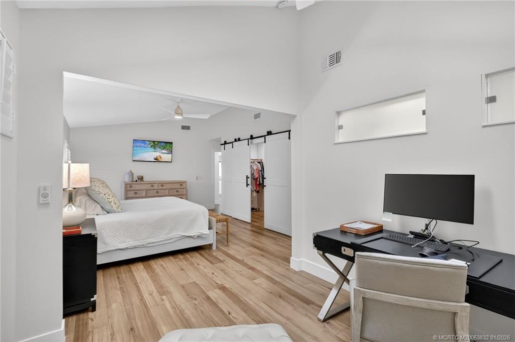 5627 Southeast Foxcross Place Stuart, FL 34997 - Photo 29 of 72 Primary Bedroom Office Sitting Area