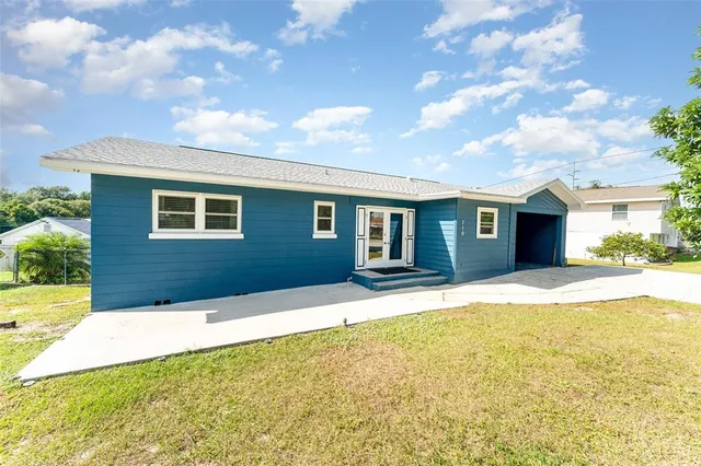 a front view of house with yard