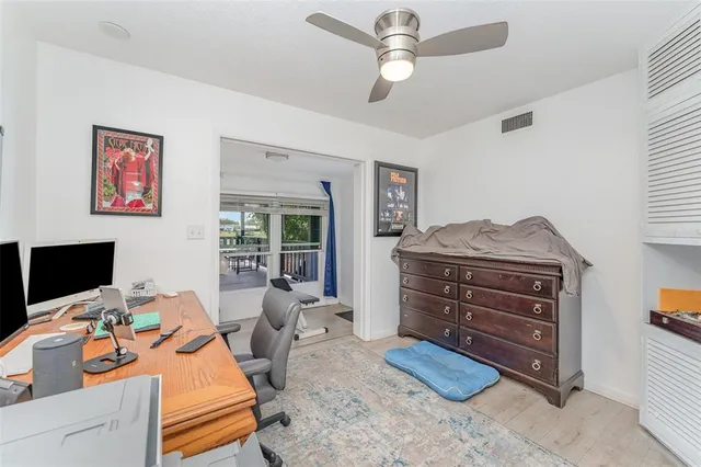 a bedroom with a bed and furniture