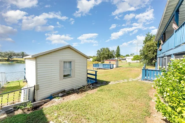 a bathroom with a sink and a yard