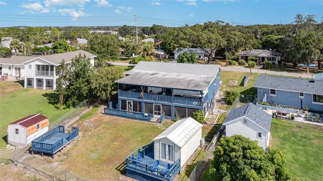 an aerial view of a house with a garden