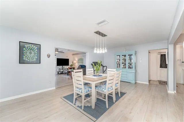 a view of a dining room with furniture