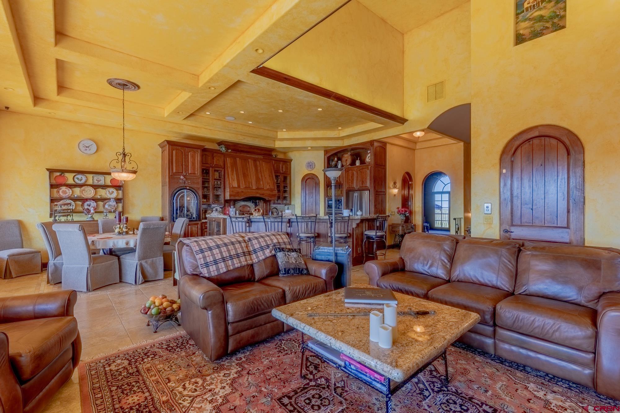 19754 Dave Wood Road Montrose, CO 81403 - Photo 14 of 35 a living room with furniture and a wooden floor