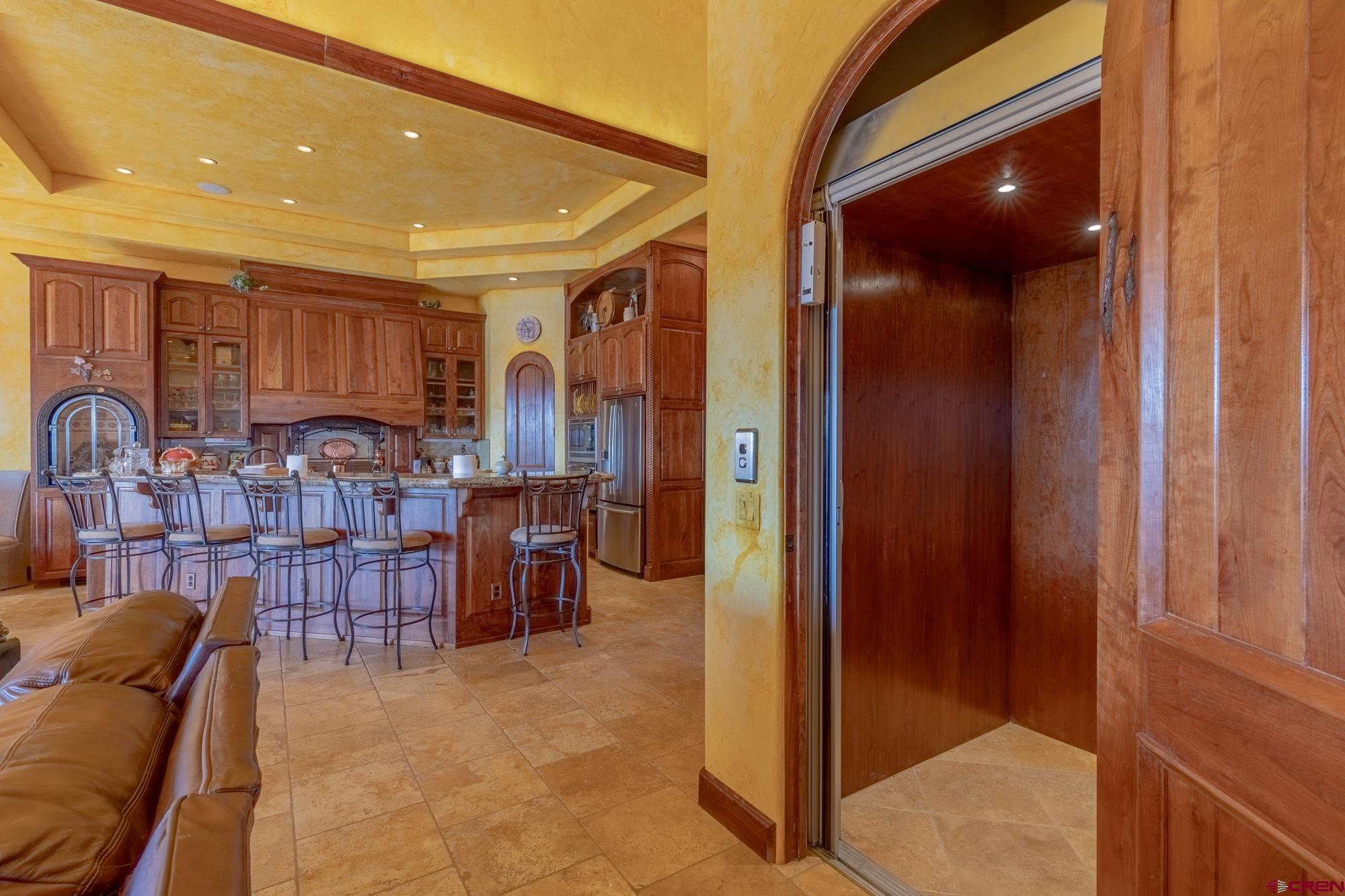 19754 Dave Wood Road Montrose, CO 81403 - Photo 17 of 35 a view of a hallway with seating area