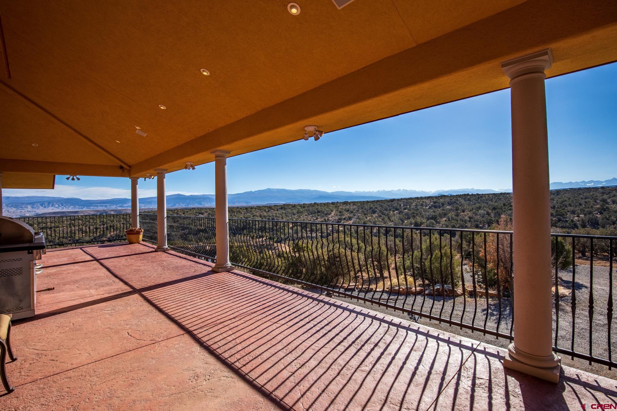 19754 Dave Wood Road Montrose, CO 81403 - Photo 31 of 35 a view of balcony with wooden floor