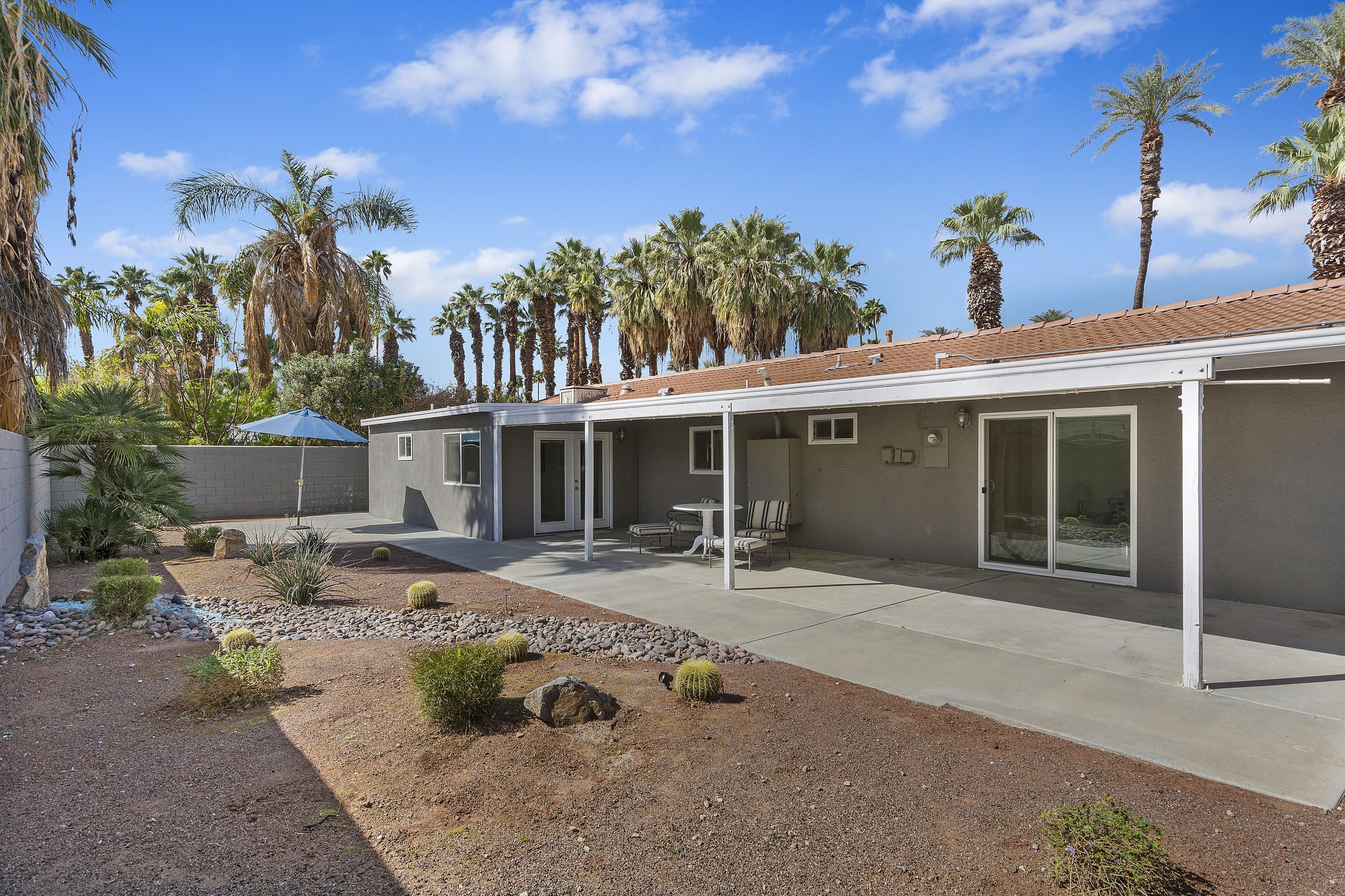 70061 Cobb Road Rancho Mirage, CA 92270 - Photo 2 of 33 front view of a house with a patio