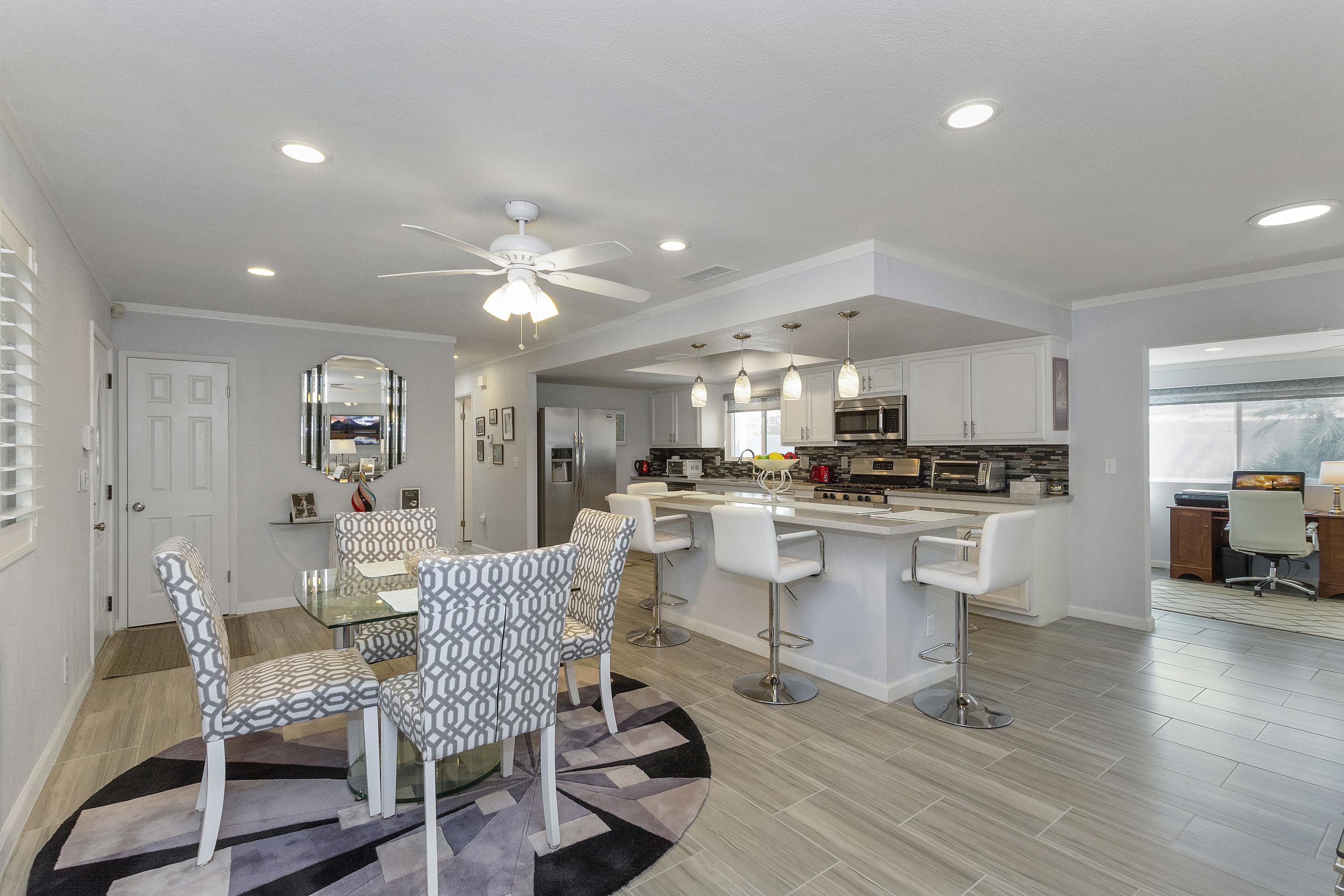 70061 Cobb Road Rancho Mirage, CA 92270 - Photo 13 of 33 a living room with furniture and kitchen view