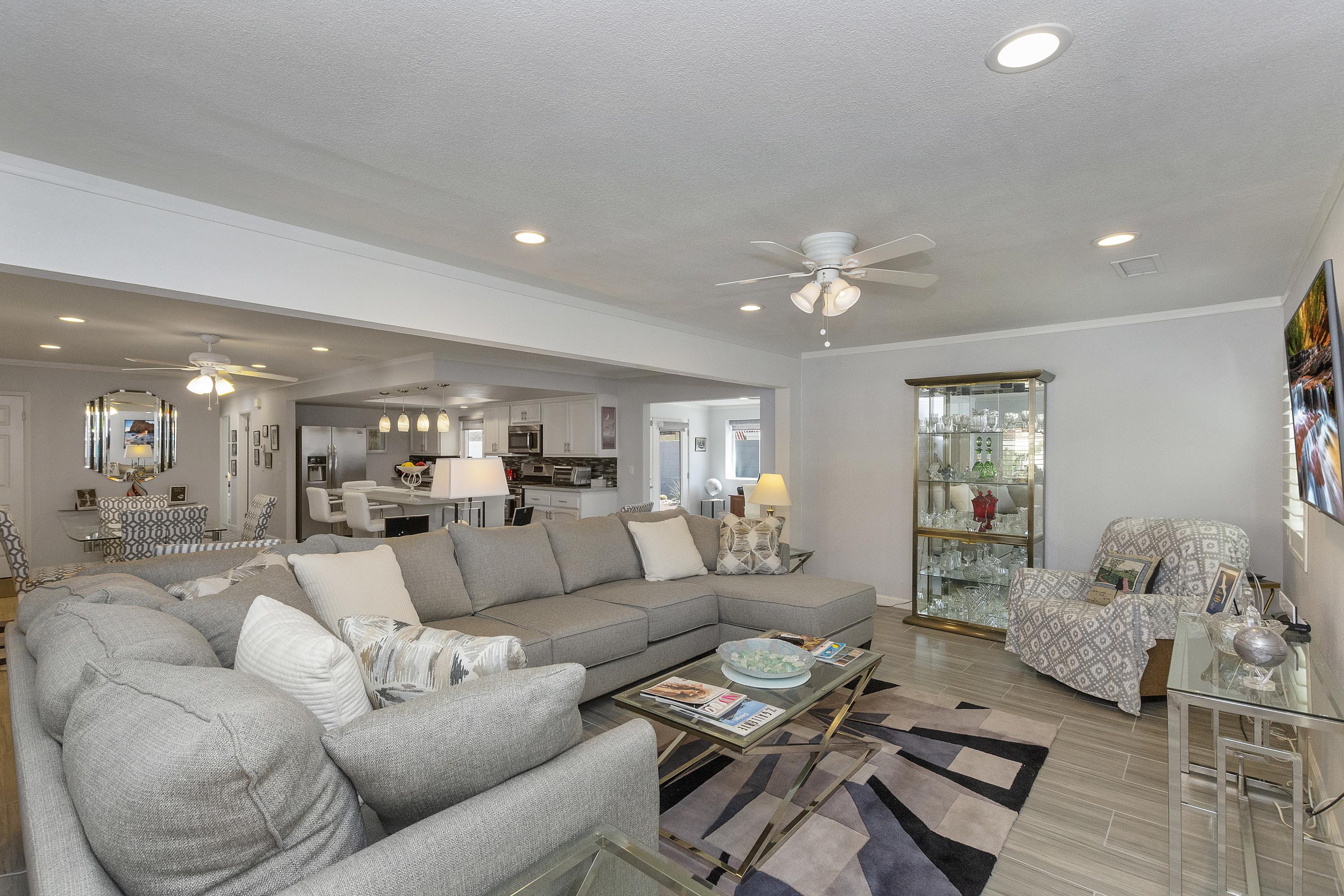 70061 Cobb Road Rancho Mirage, CA 92270 - Photo 17 of 33 a living room with furniture and wooden floor