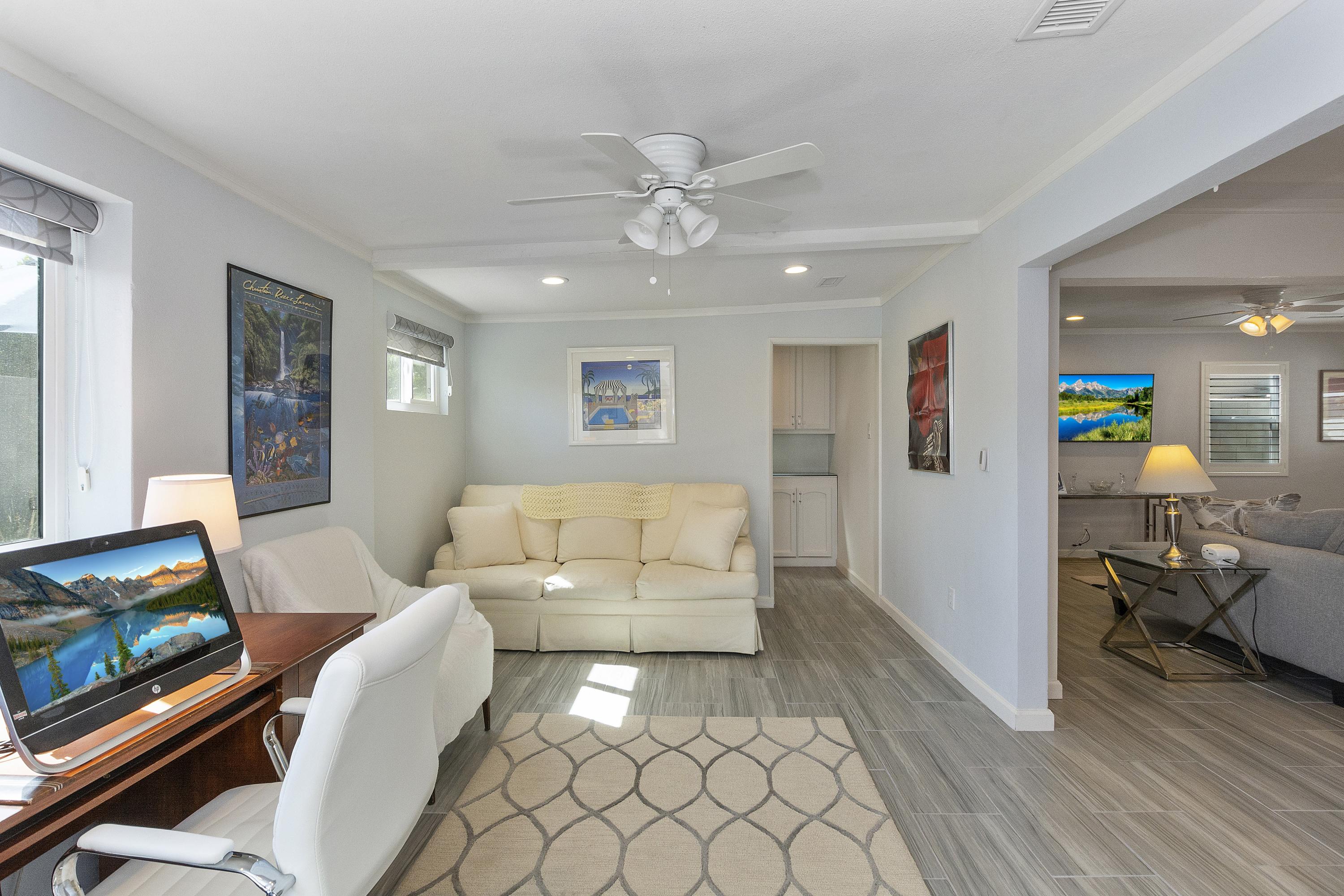 70061 Cobb Road Rancho Mirage, CA 92270 - Photo 18 of 33 a living room with furniture and a flat screen tv