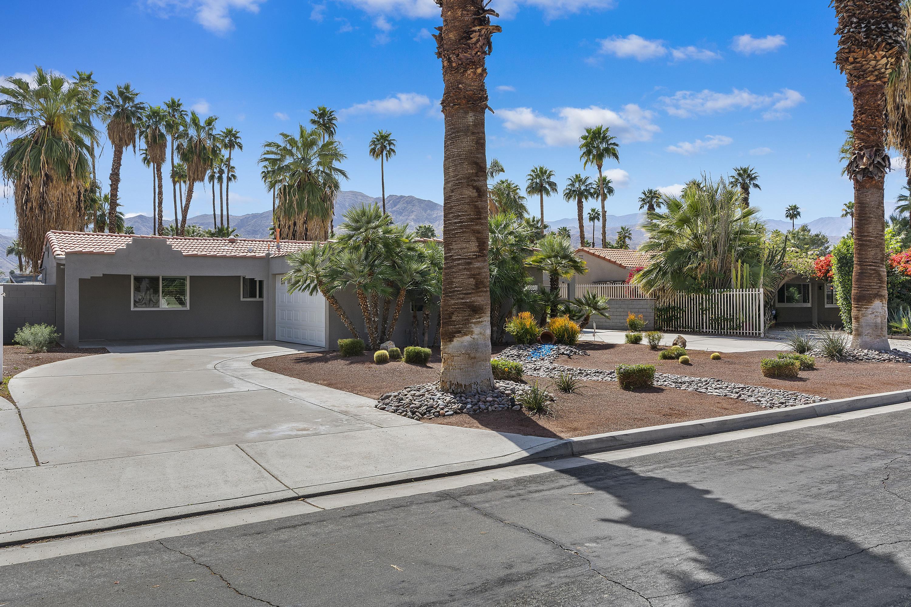 70061 Cobb Road Rancho Mirage, CA 92270 - Photo 3 of 33 a view of a house with palm trees