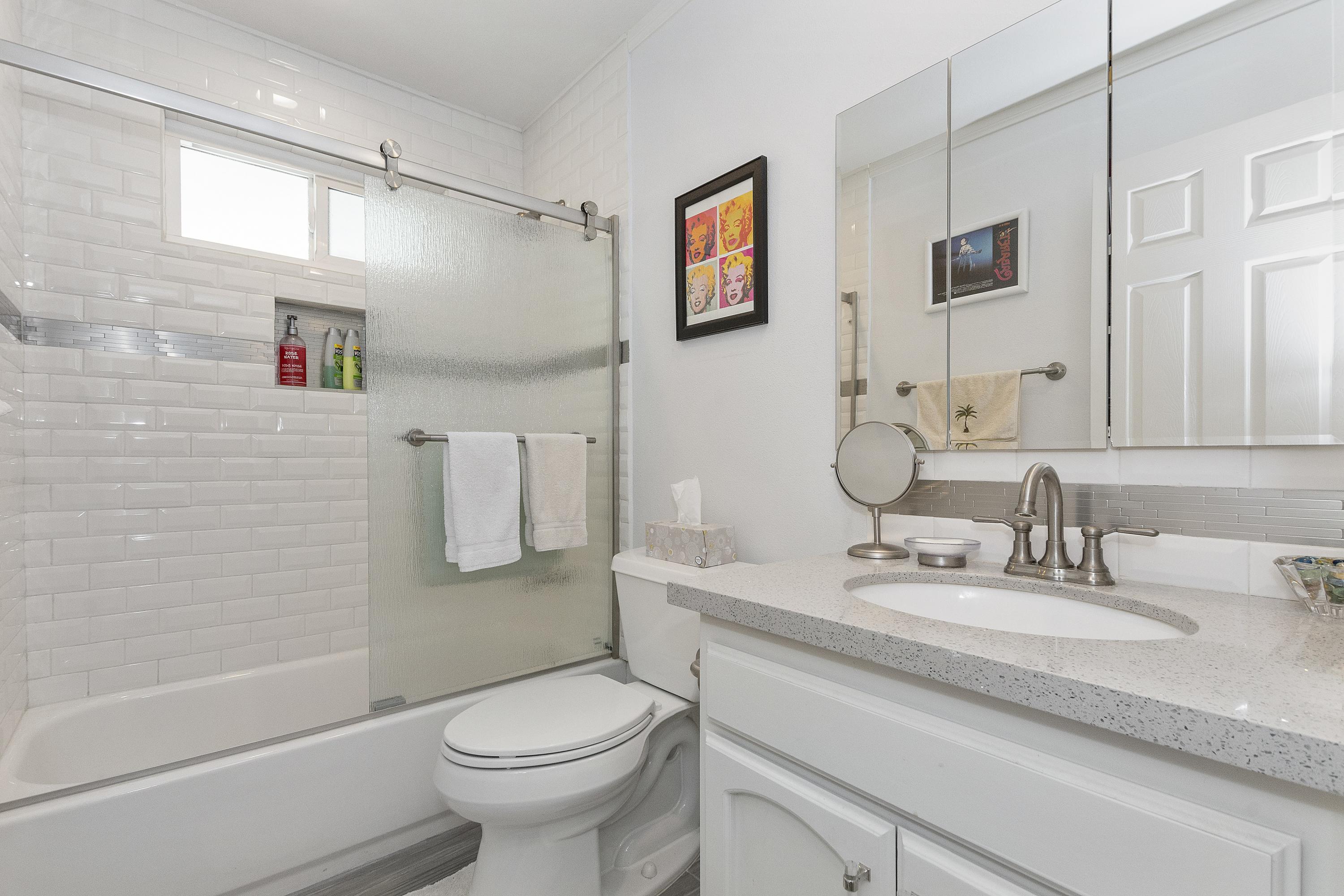 70061 Cobb Road Rancho Mirage, CA 92270 - Photo 21 of 33 a bathroom with a sink toilet and shower