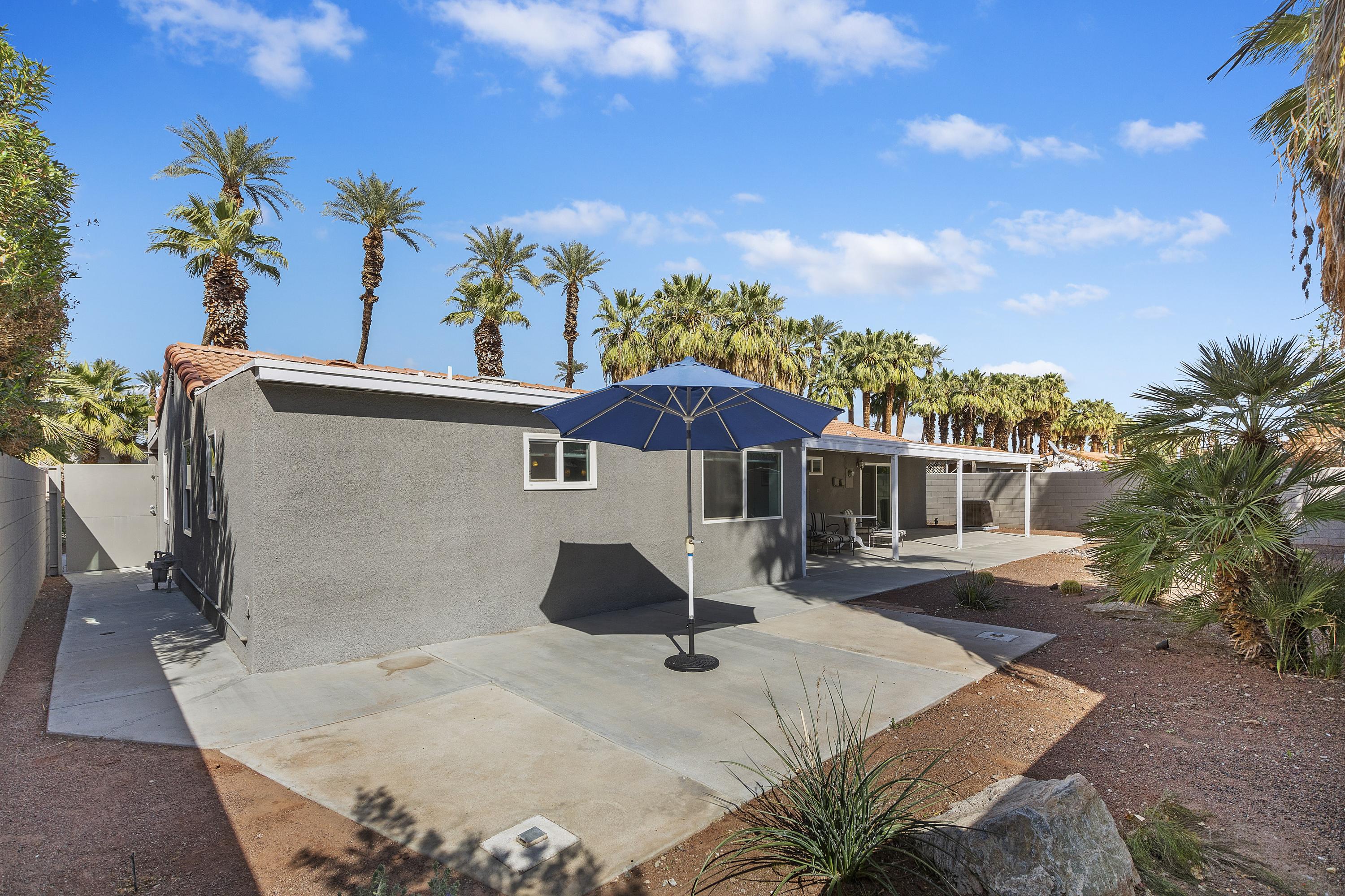 70061 Cobb Road Rancho Mirage, CA 92270 - Photo 31 of 33 a view of a house with patio