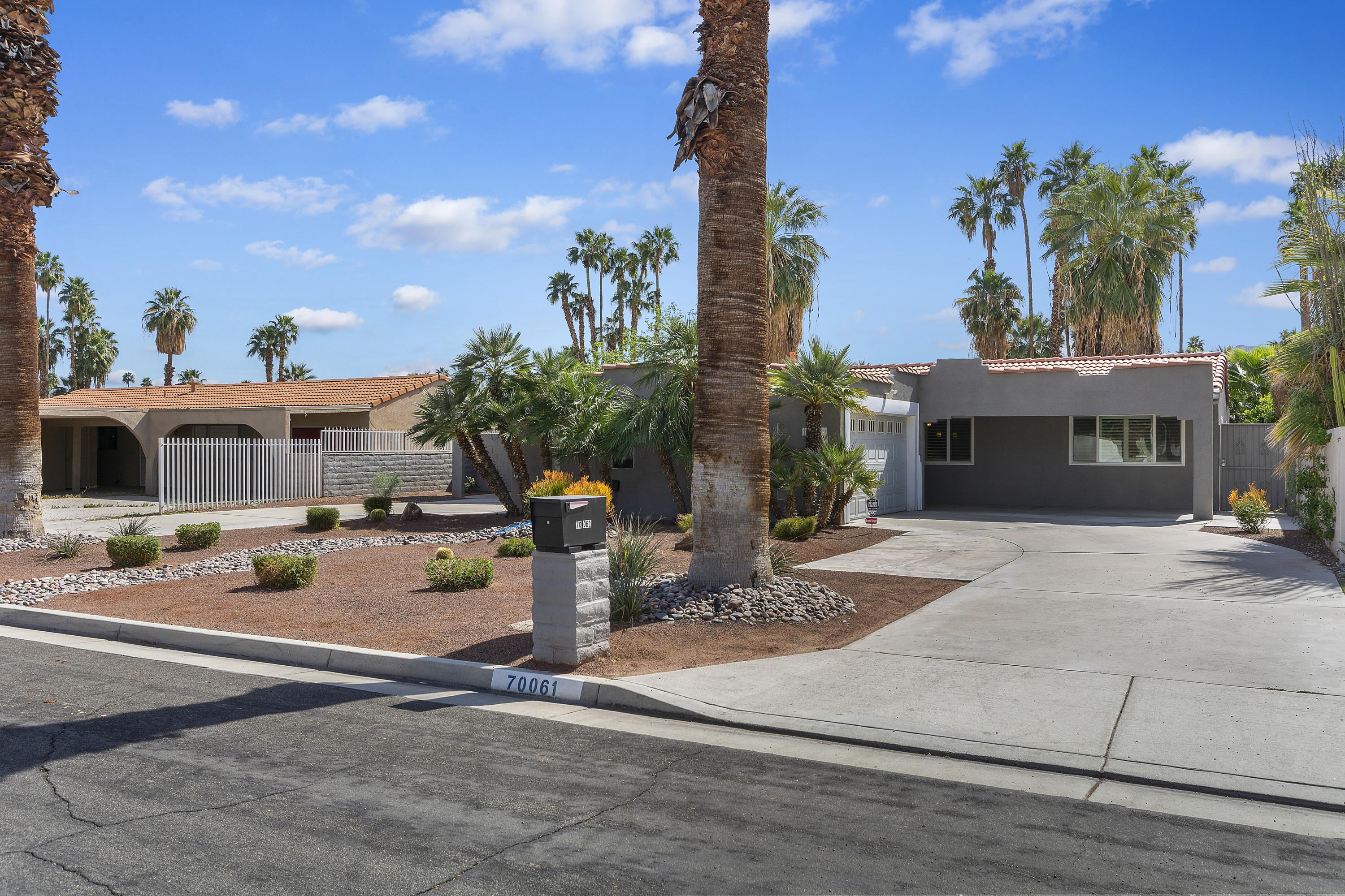 70061 Cobb Road Rancho Mirage, CA 92270 - Photo 5 of 33 a view of a house with sitting area and garden