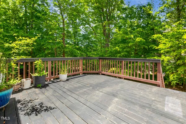 a view of deck with wooden floor and seating space