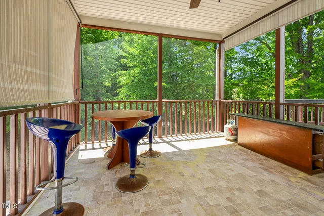 a view of balcony with furniture