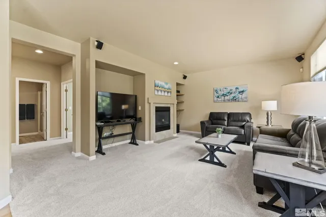 a living room with furniture and a window