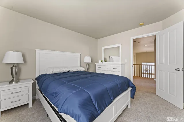 a bathroom with a sink double vanity and a mirror