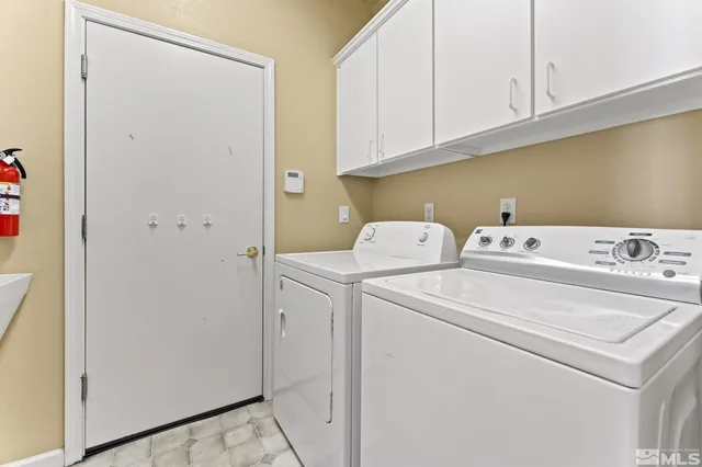 a view of a yard with flower plants