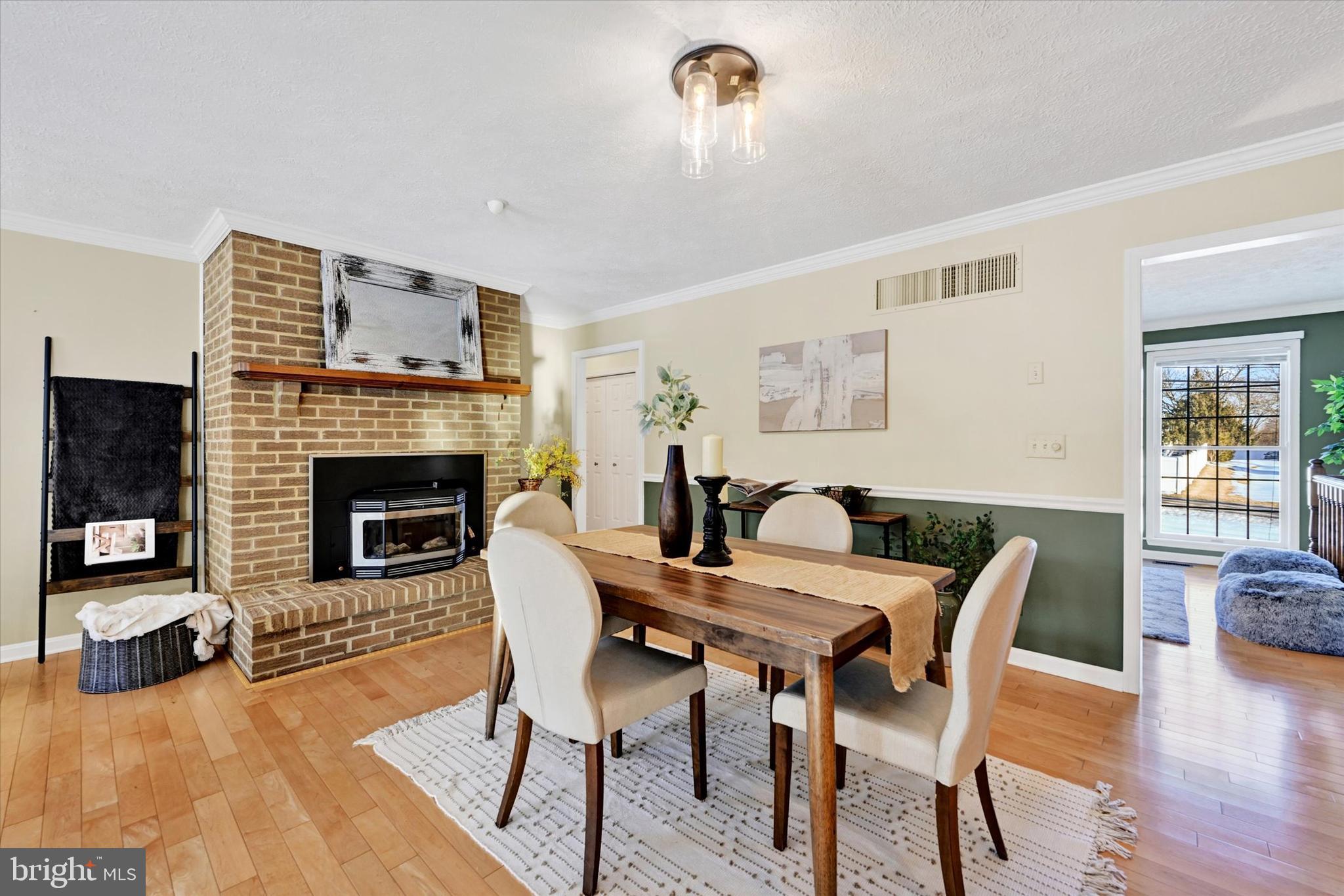 7710 Gum Spring Road Baltimore, MD 21237 - Photo 11 of 61 Dining Room w/pellet stove