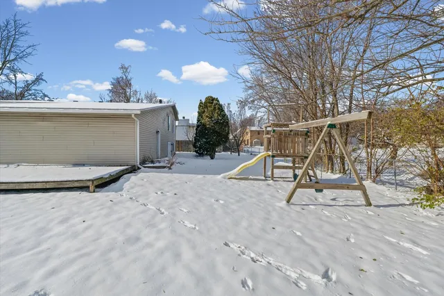 a view of a backyard of a house
