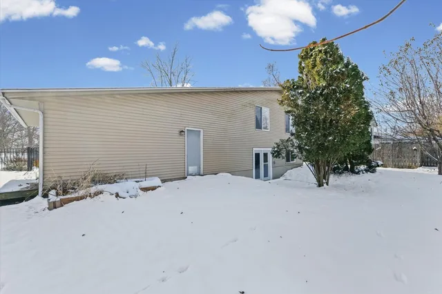 a view of backyard of a house