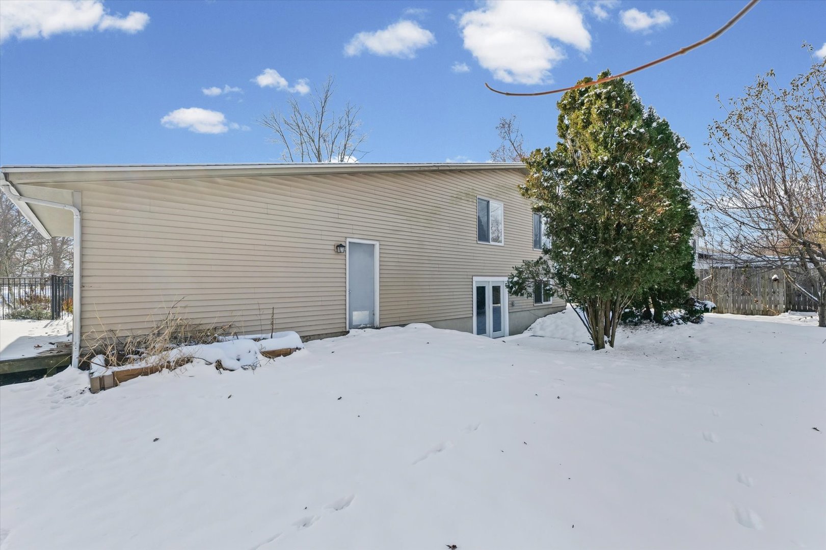 702 Devonshire Drive Champaign, IL 61820 - Photo 33 of 37 a view of a backyard of a house