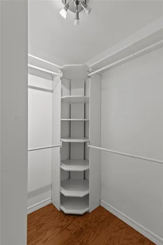 a view of an empty walk in closet