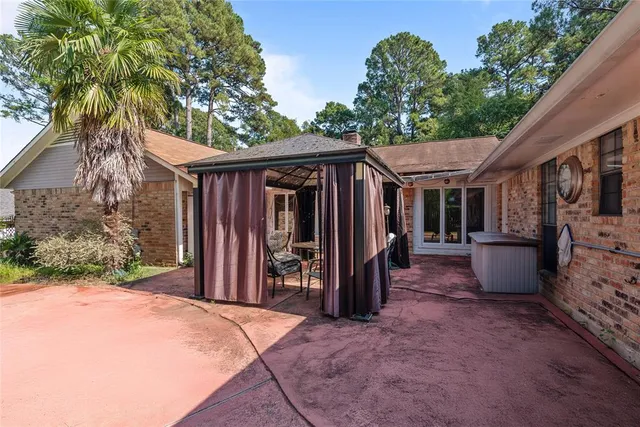 a view of a backyard of the house