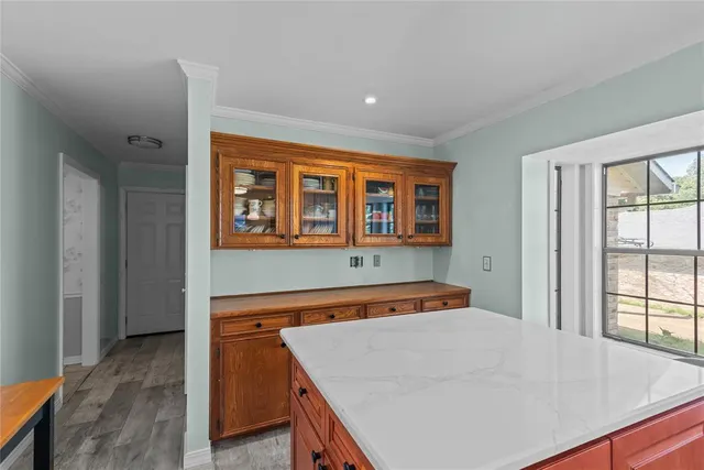 a bed room with a bed and a window