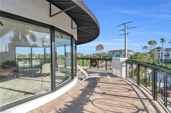 a view of a balcony with couch