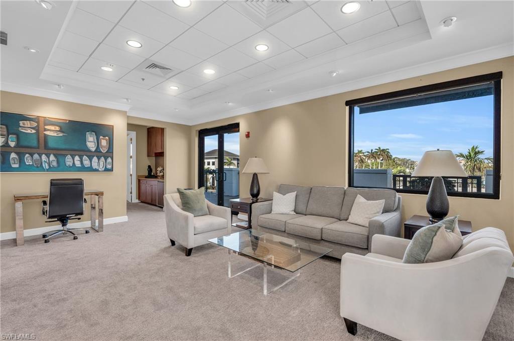 428 9th Street South Naples, FL 34102 - Photo 17 of 24 a living room with furniture and a large window