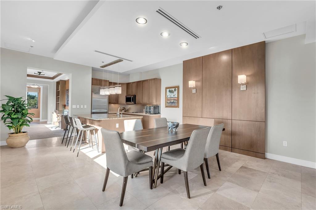 428 9th Street South Naples, FL 34102 - Photo 8 of 24 a view of a dining room with furniture