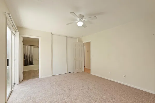 a view of a livingroom with a ceiling fan