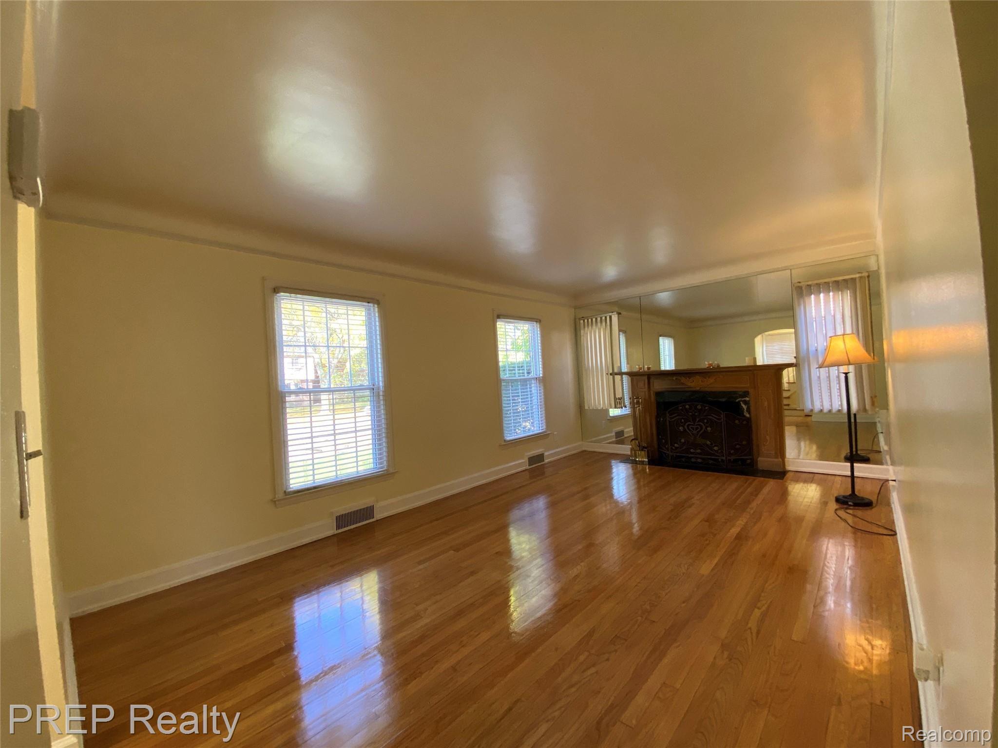 14168 Stahelin Road Detroit, MI 48223 - Photo 4 of 22 Living Room/Fireplace View