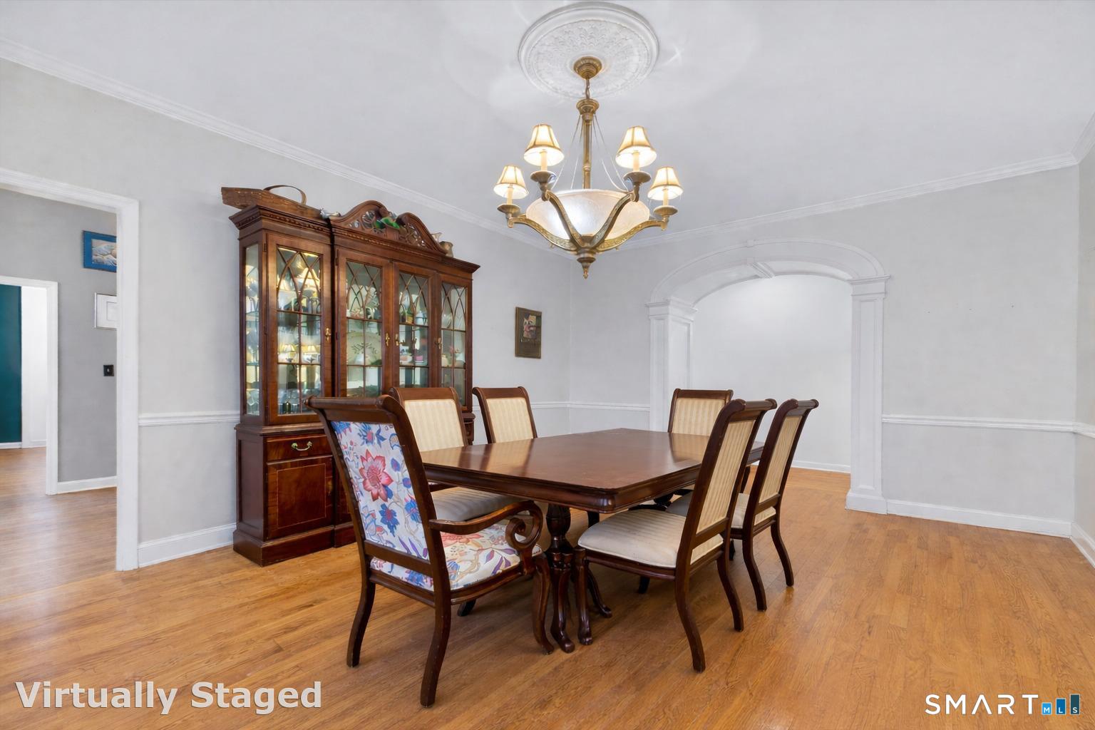 123 A Peaceable Street Redding, CT 06896 - Photo 16 of 44 a view of a dining room with furniture wooden floor and chandelier