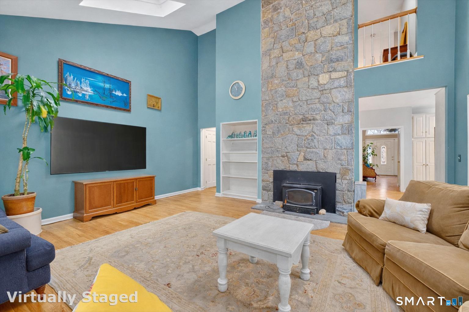 123 A Peaceable Street Redding, CT 06896 - Photo 24 of 44 a living room with furniture and a flat screen tv