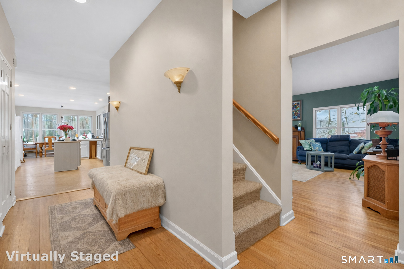 123 A Peaceable Street Redding, CT 06896 - Photo 30 of 44 a living room with furniture and a dining table with wooden floor