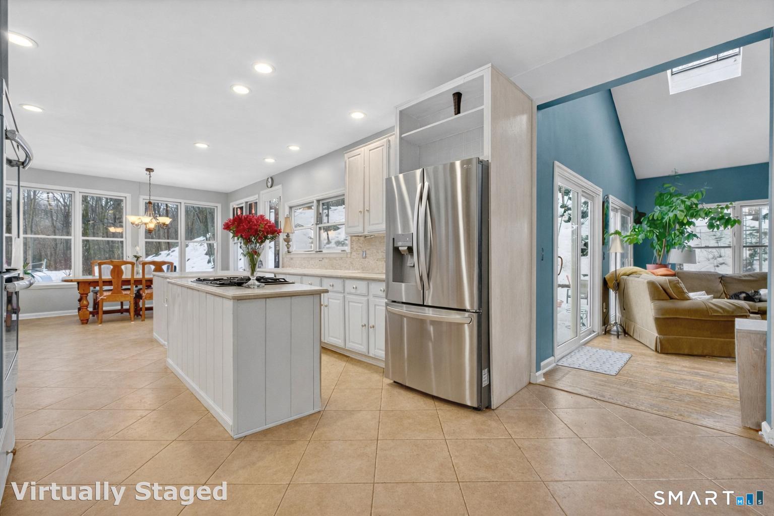123 A Peaceable Street Redding, CT 06896 - Photo 4 of 44 a kitchen with refrigerator and furniture
