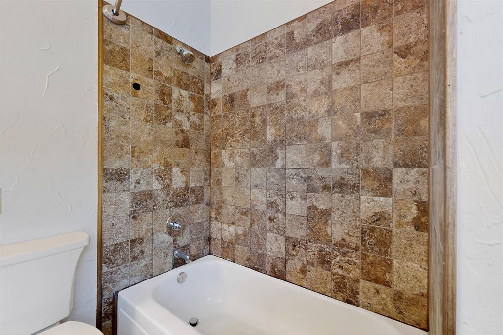 664 Phillips Drive Coppell, TX 75019 - Photo 15 of 23 primary bathroom with bathtub