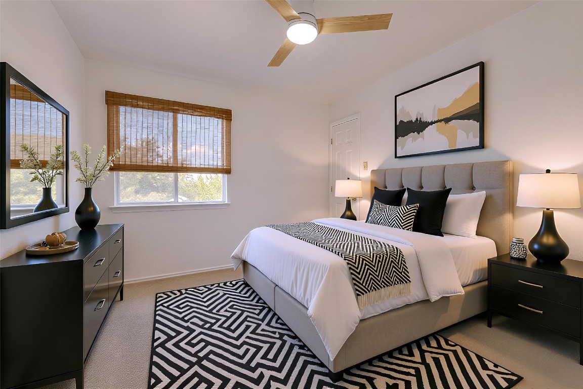 356 Wetzel Kyle, TX 78640 - Photo 14 of 24 a bedroom with double bed and a window