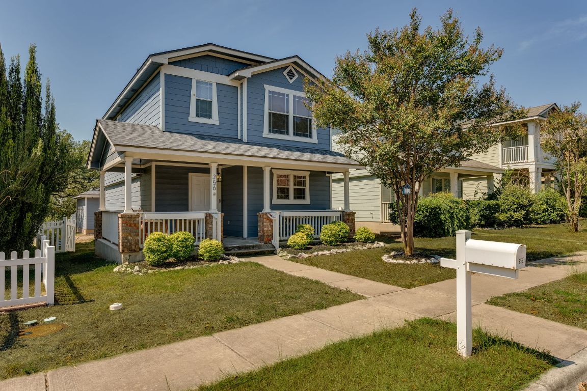 356 Wetzel Kyle, TX 78640 - Photo 2 of 24 a front view of a house with a yard