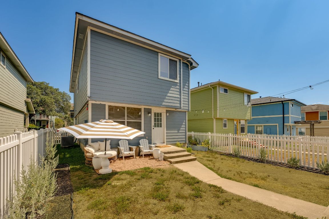 356 Wetzel Kyle, TX 78640 - Photo 21 of 24 a view of a house with a yard and wooden fence